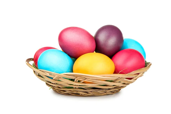 Easter eggs in basket isolated on white background — Stock Photo, Image