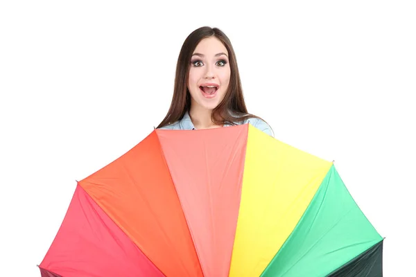 Junges Mädchen mit buntem Regenschirm auf weißem Hintergrund — Stockfoto