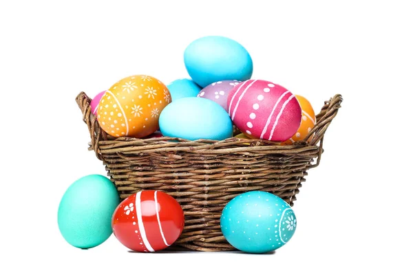 Easter eggs in basket isolated on white background — Stock Photo, Image