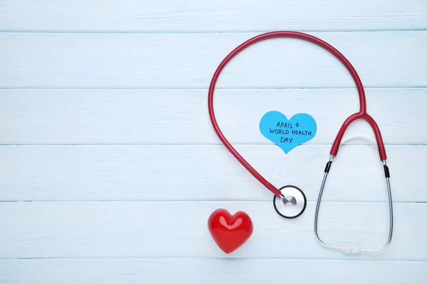 Text April World Health Day Stethoscope Red Heart Wooden Table — Stock Photo, Image