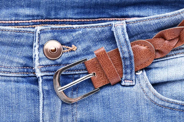 Fashion jeans with leather belt background