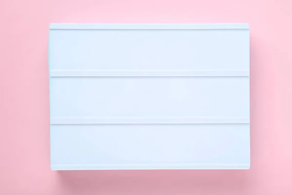 Leere Lightbox auf rosa Hintergrund — Stockfoto