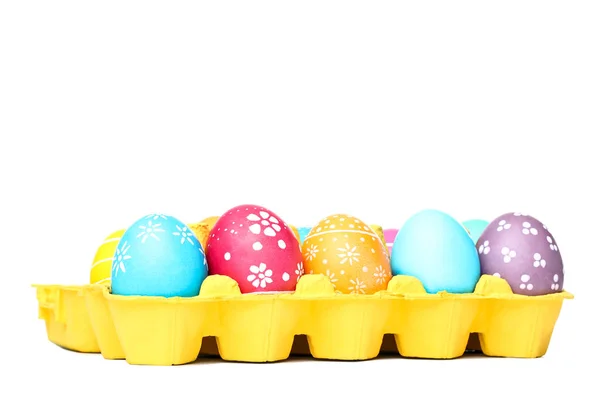 Easter eggs in carton box isolated on white background — Stock Photo, Image