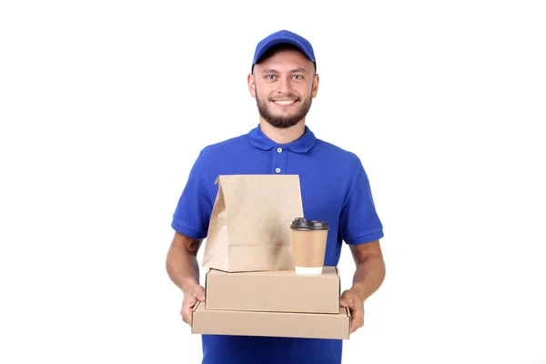 Entrega homem com caixas, saco de papel e copo no fundo branco — Fotografia de Stock