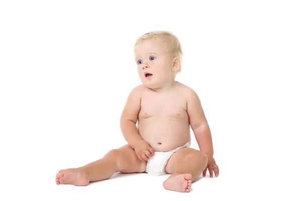 Baby girl sitting on white background — Stock Photo, Image