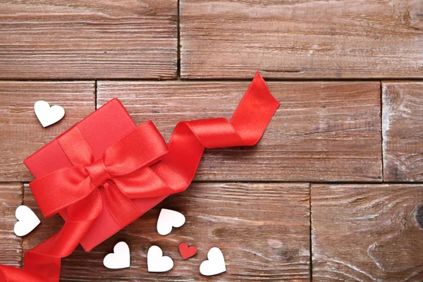 Gift Box Ribbon Bow Hearts Brown Wooden Table — Stock Photo, Image