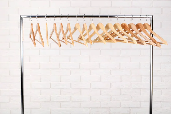 Wooden Hangers Hanging Grey Background — Stock Photo, Image