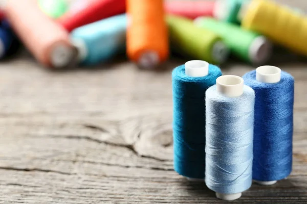 Colourful Thread Spools Grey Wooden Table — Stock Photo, Image