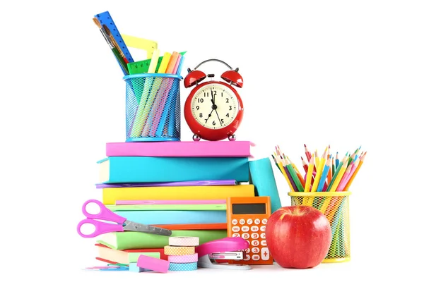 Beyaz arka planda çalar saat ile okul malzemeleri — Stok fotoğraf