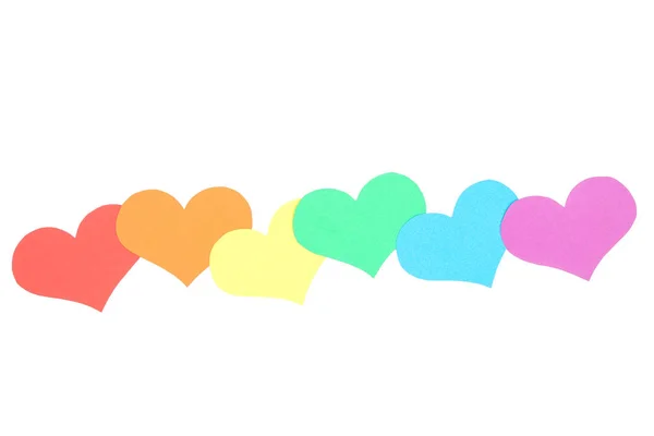 Corações arco-íris no fundo branco — Fotografia de Stock