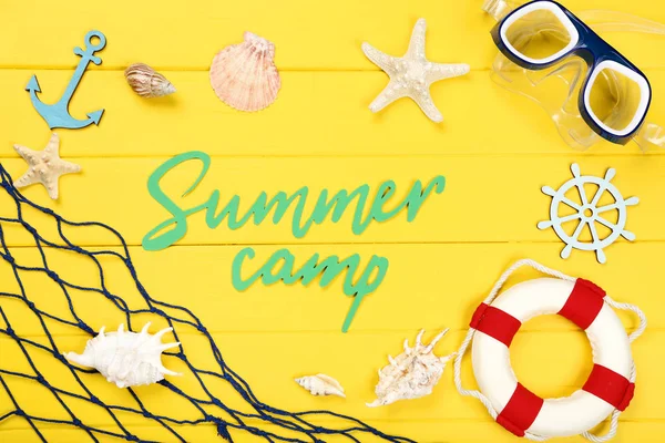 Paper text Summer camp with seashells, lifebuoy and diving mask — Stock Photo, Image