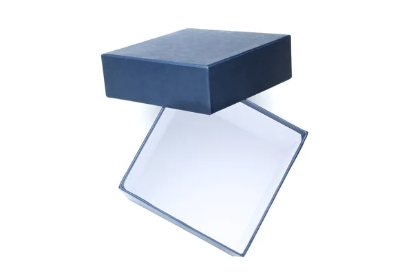 Открытая синяя коробка подарка на белом фоне — стоковое фото