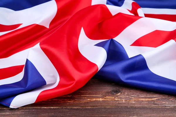 British flag on wooden table — Stock Photo, Image