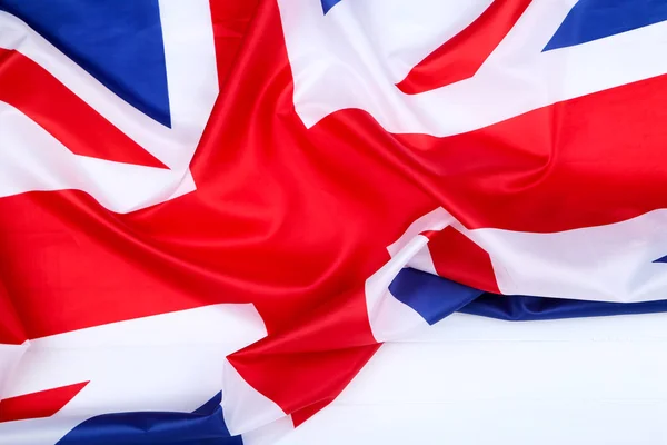 British flag on white wooden background — Stock Photo, Image