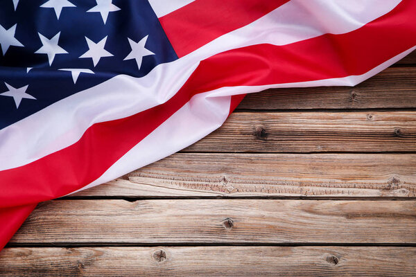 American flag on brown wooden table