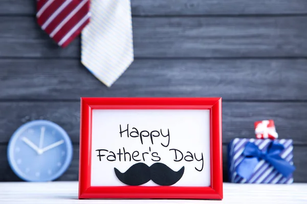 Text Happy Fathers Day in frame with black mustache and neckties — Stock Photo, Image
