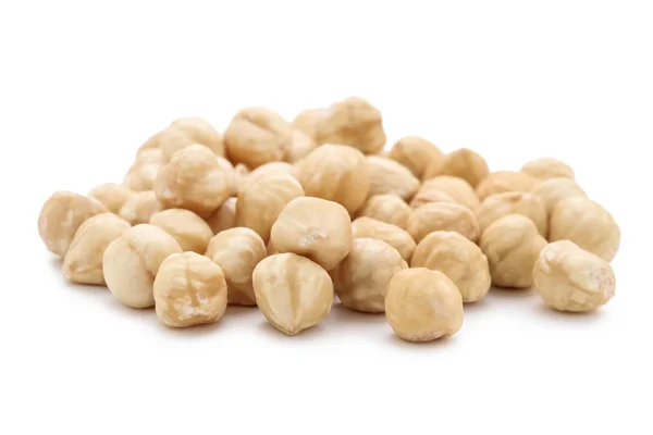 Peeled hazelnuts on isolated white background — Stock Photo, Image
