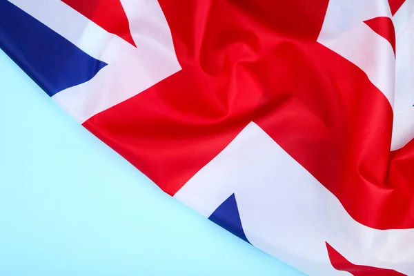 Bandera británica sobre fondo azul —  Fotos de Stock