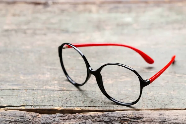 Óculos de olho na mesa de madeira cinza — Fotografia de Stock