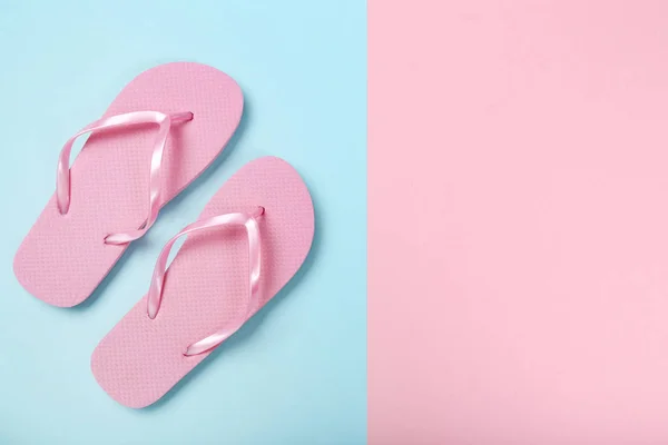 Pair of flip flops on colorful background — Stock Photo, Image