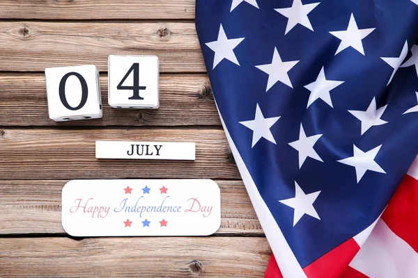 Text Happy Independence Day with american flag and cube calendar — Stock Photo, Image