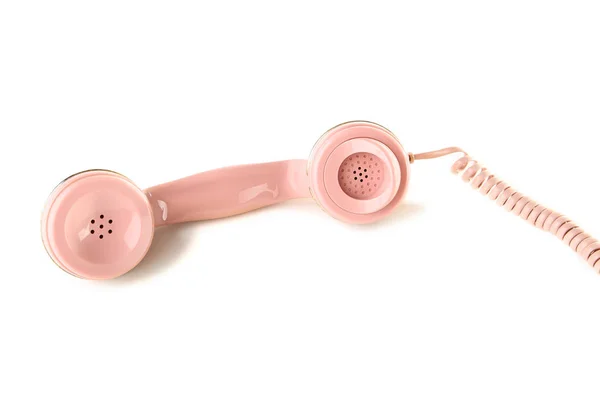 Telefone rosa auscultador isolado no fundo branco — Fotografia de Stock