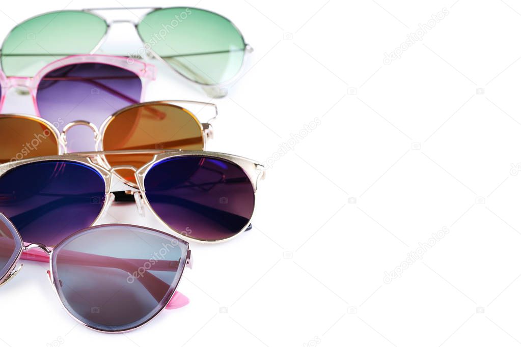 Colorful sunglasses on white background