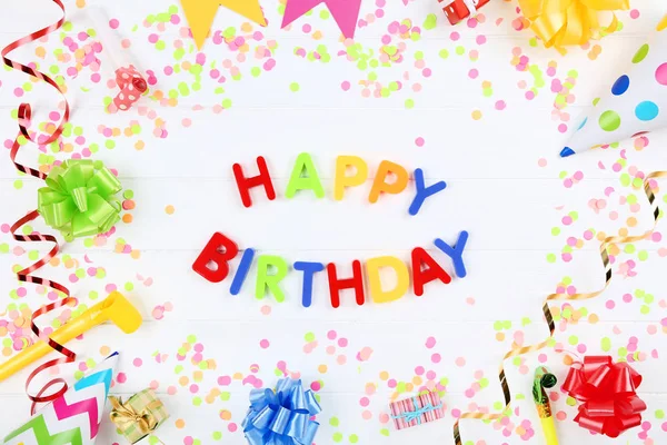 Text Happy Birthday by plastic letters with decorations and conf — Stock Photo, Image