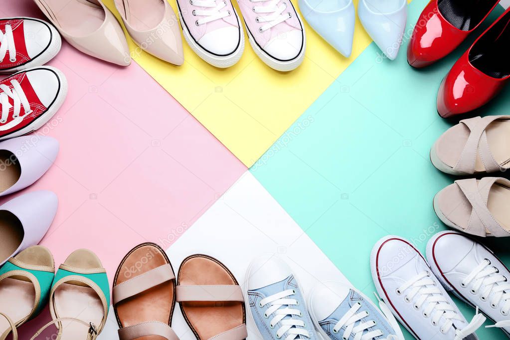 Different female shoes on colorful background