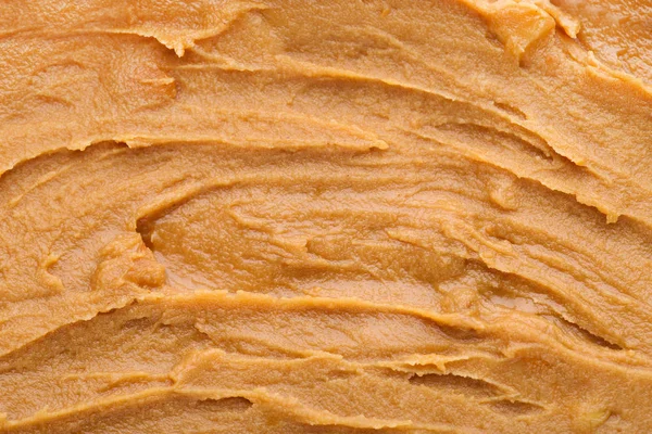 Background of peanut butter — Stock Photo, Image