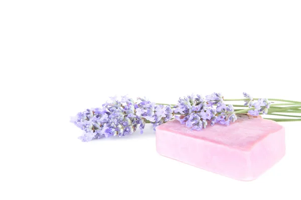 Lavender flowers with soap on white background — Stock Photo, Image