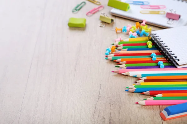 School supplies on brown wooden table — Stock Photo, Image