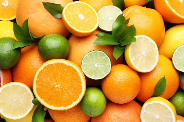 绿叶柑橘类水果的背景 — 图库照片