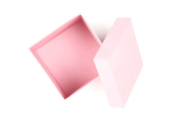 흰색 배경에 분리되어 있는 분홍색 선물 상자를 여는 모습 — 스톡 사진