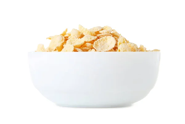 Flocons de maïs dans un bol sur fond blanc — Photo