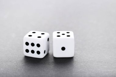 Dice on grey background clipart