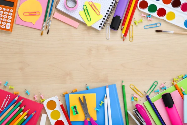 School supplies on brown wooden table — Stock Photo, Image