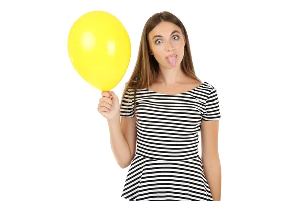 Jovem com balão amarelo sobre fundo branco — Fotografia de Stock