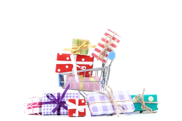 Small shopping cart with gift boxes isolated on white background — Stock Photo, Image