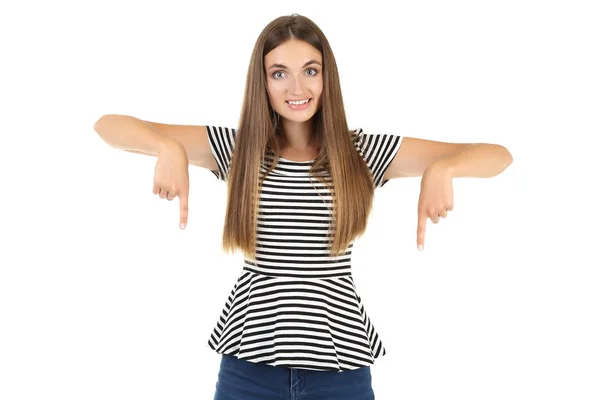 Jonge vrouw toont vingers naar beneden geïsoleerd op witte achtergrond — Stockfoto