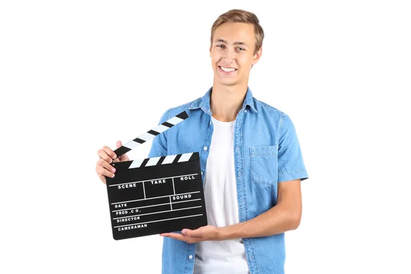 Young man with clapper board isolated on white background — Stock Photo, Image