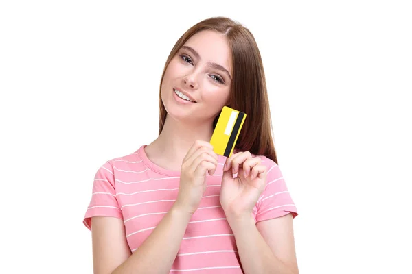Junge Frau mit Kreditkarte auf weißem Hintergrund — Stockfoto