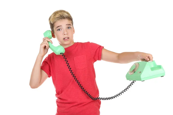 Menino com aparelho e telefone sobre fundo branco — Fotografia de Stock