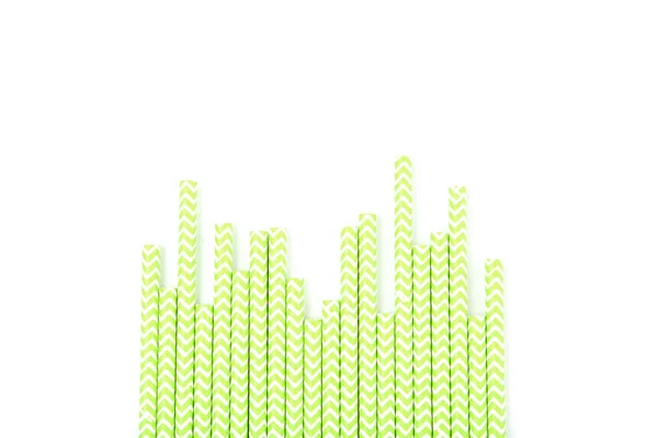 Grön papper halmstrån på vit bakgrund — Stockfoto