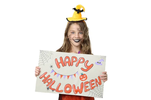 Mooi meisje in kostuum Holding papier met tekst gelukkig Hallowee — Stockfoto