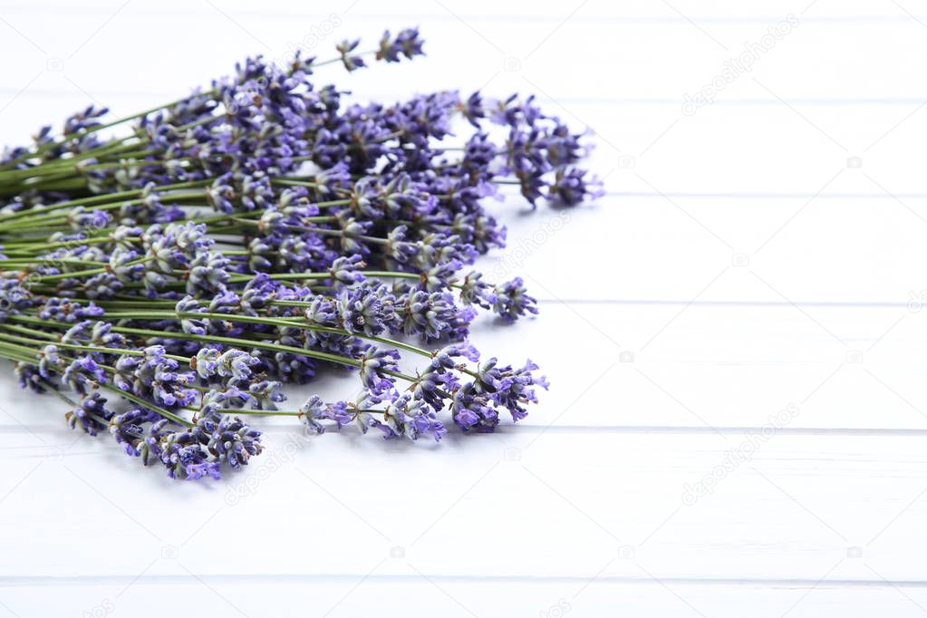 Lavender flowers on white wooden table