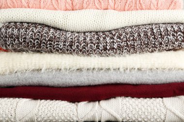 Katlanmış süveterlerin arka planı