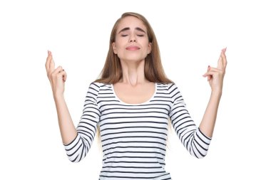 Genç ve güzel bir kız beyaz sırtından el hareketi yapıyor.