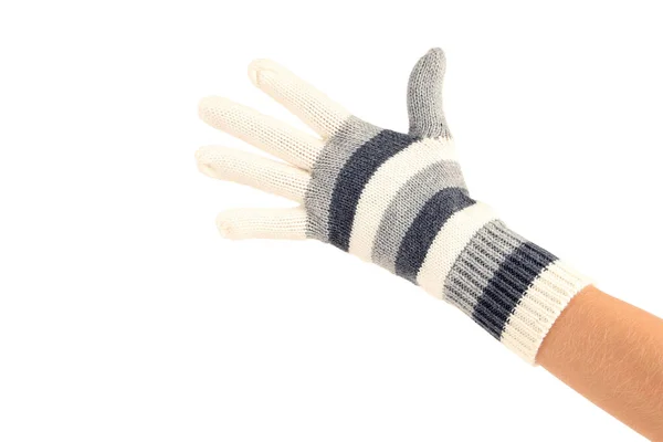 Рука в вязаной варежке на белом фоне — стоковое фото