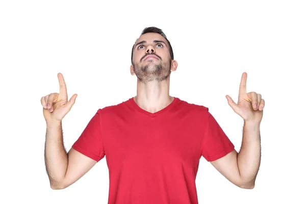 Retrato de un joven barbudo mostrando los dedos hacia arriba aislado en blanco — Foto de Stock